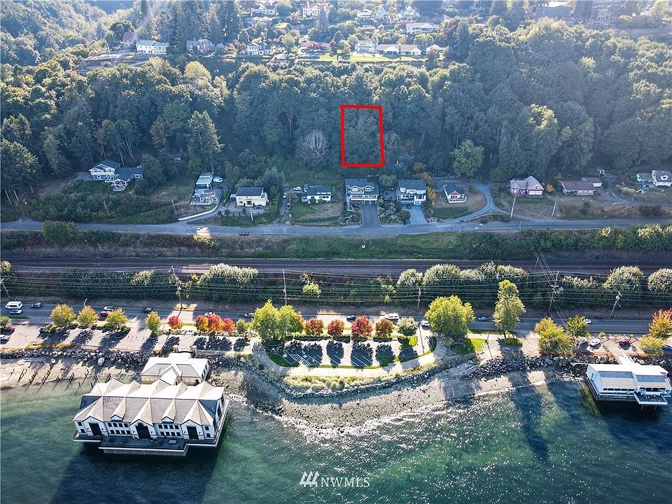 Vacant land view lot above 4212 N Waterview. Access road is to the right two doors down. Sewer and storm drain is in the road. 
