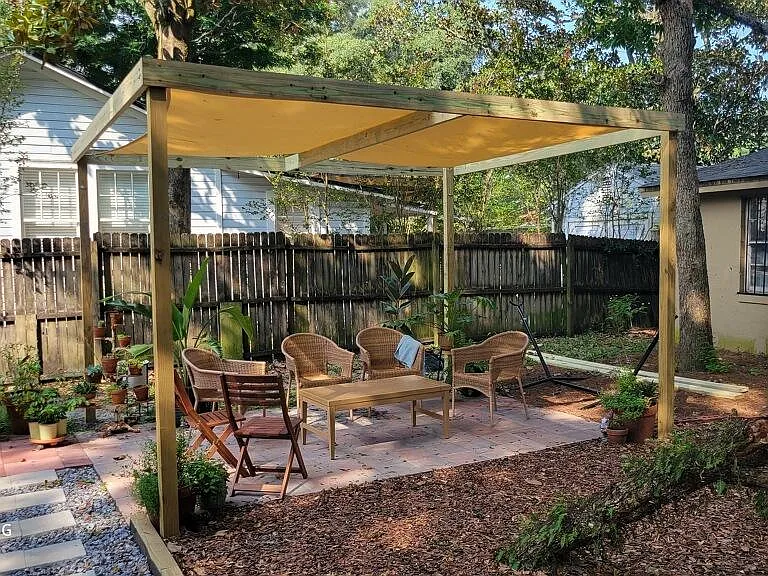 Backyard pergola (fence has been replaced since photo).