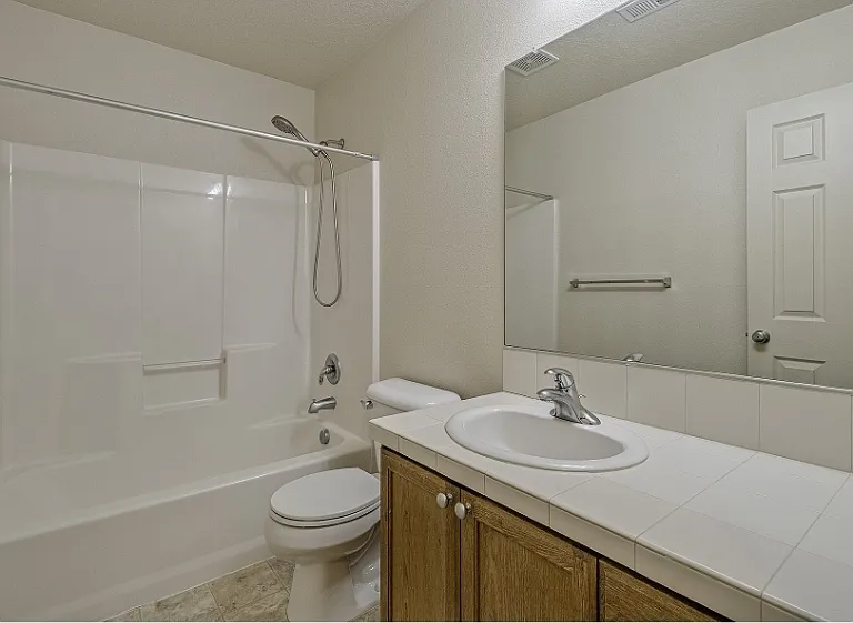909 SE Sacha Pl — Photo 16