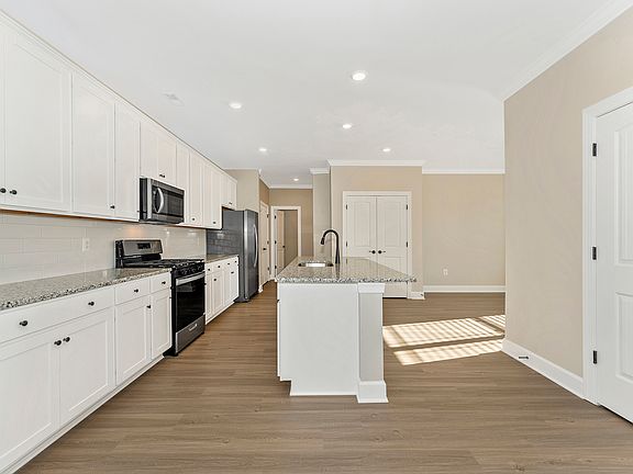 The kitchen comes with granite countertops
