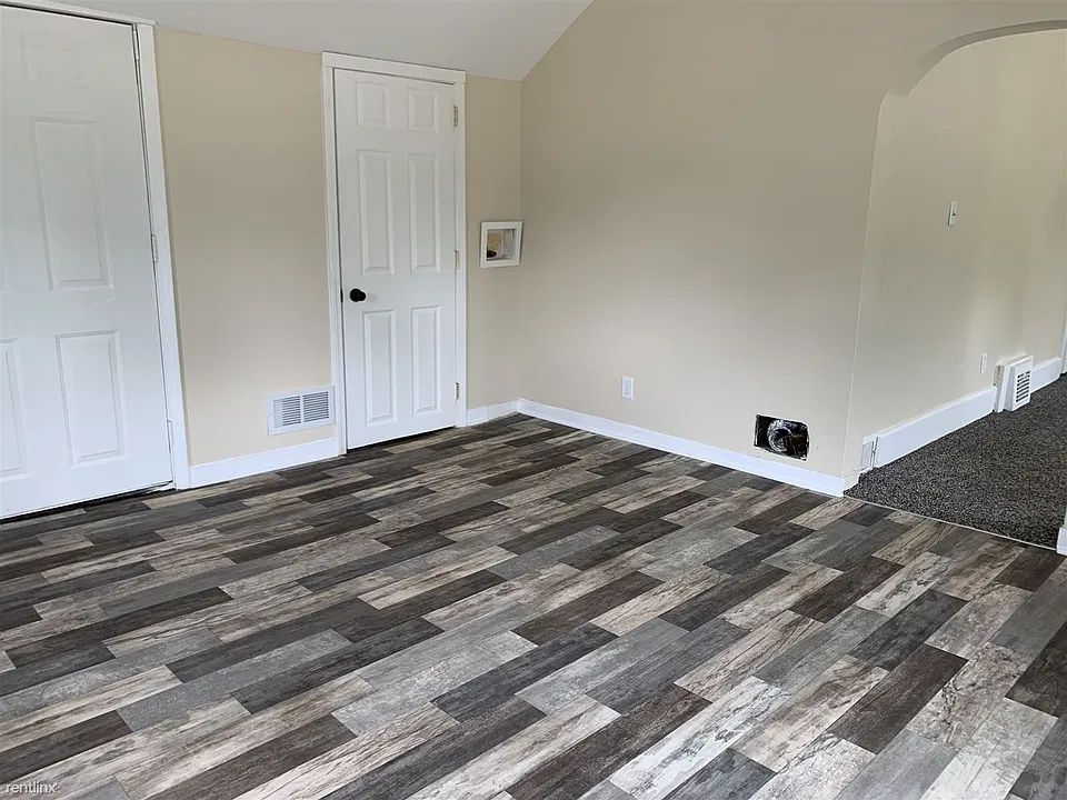 Other side of kitchen, bathroom off of kitchen, washer and d