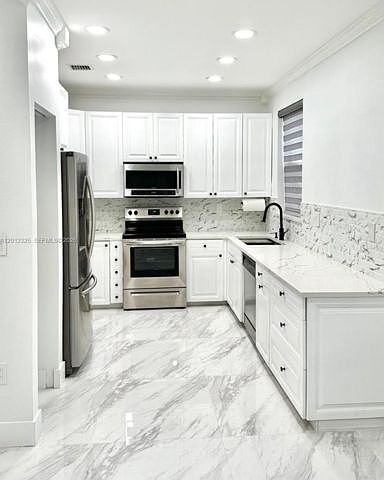 1st image of 721 NW 170th Ter