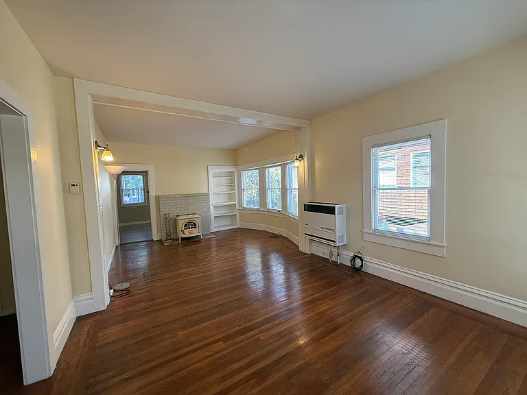 Living room looking north into dining area & kitchen