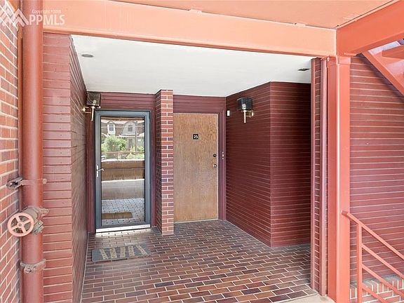 Covered unit entrance.