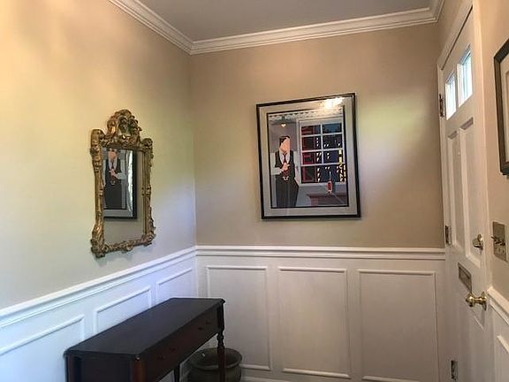 Hallway Entrance to 2nd Floor Apartment ; and Laundry Area