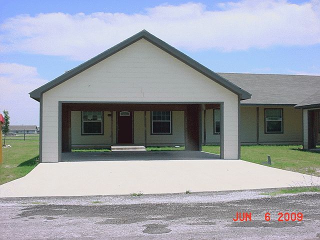 Front view with Carport