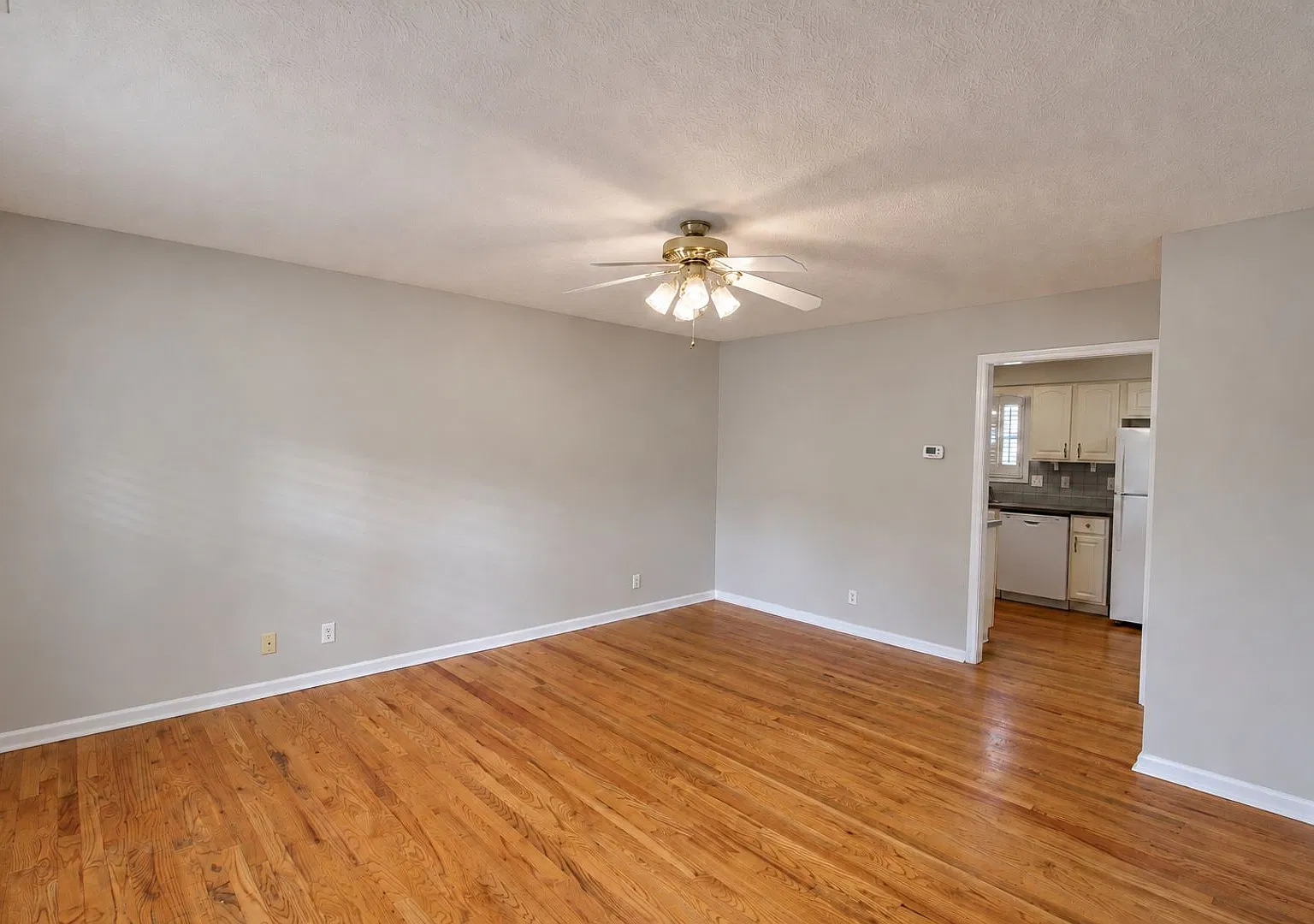 3-Bedroom Home with Main-Level Primary Suite, Sunroom & 2-Car Garage — Photo 3