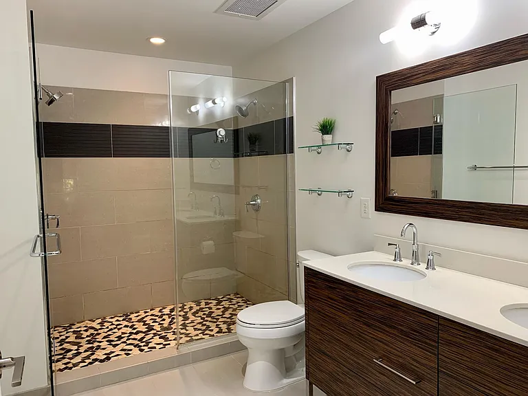 Master Bathroom with Double Vanity and Dual Shower Heads