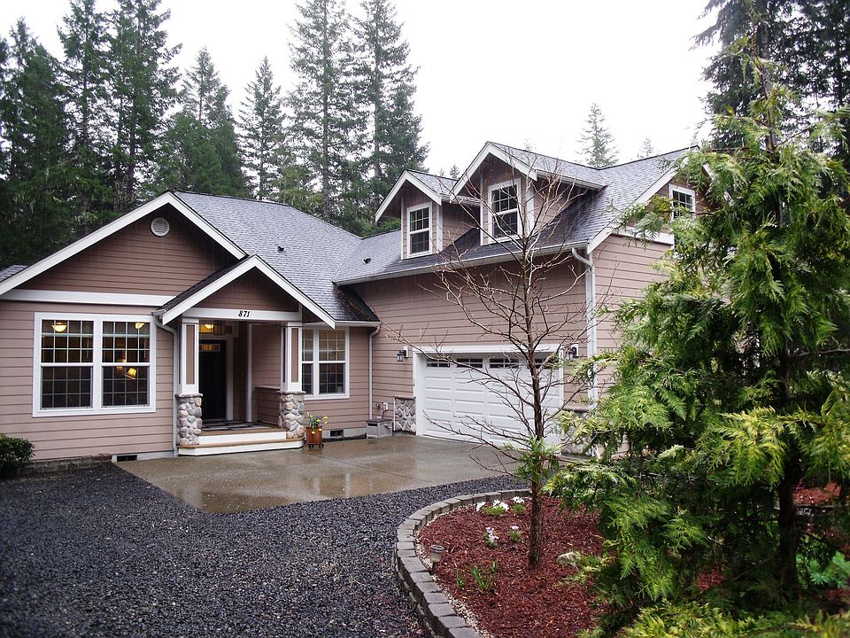 Large covered porch invites all who visit