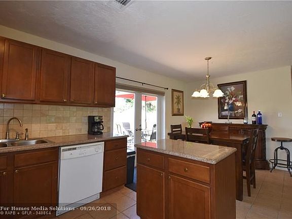 5th image of 551 NE 58th Ct
