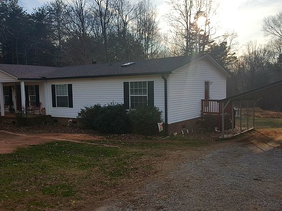 side with new carport