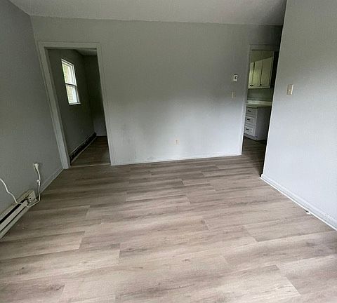 Living area looking toward dining and kitchen area