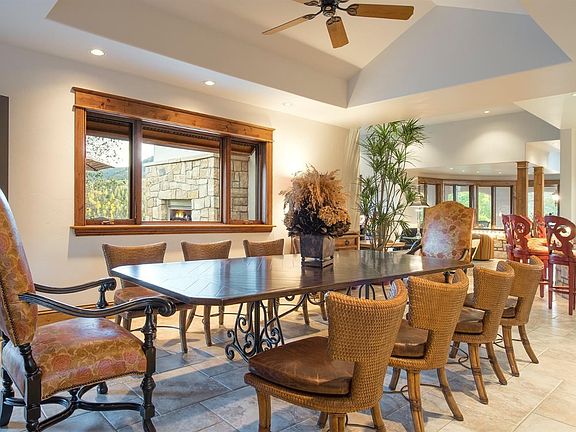I love this dining room. It is large enough to easily sit 10 people. Windows provide great views. In-floor radiant heat.