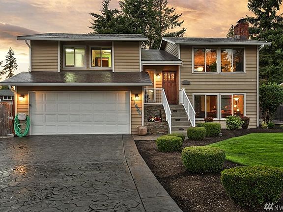 Classic split level with a dreamy stamped concrete driveway. RV parking on both sides of the home. Plenty of yard space. Beautifully landscaped front & back yard.