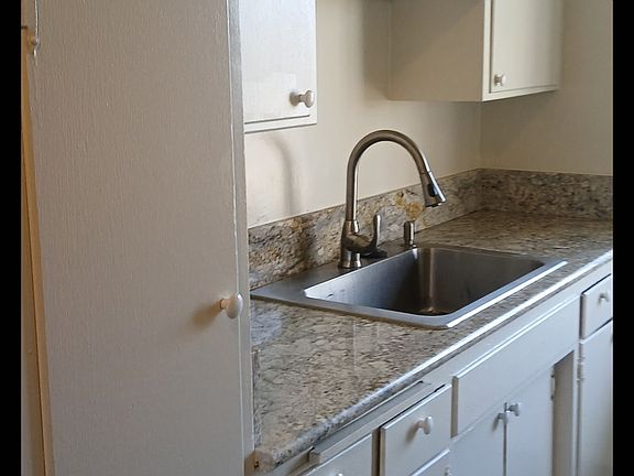Kitchen sink, counter & cabinetry