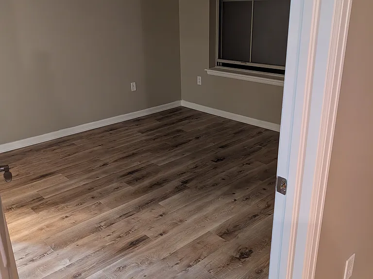 Bedroom entrance with new flooring.