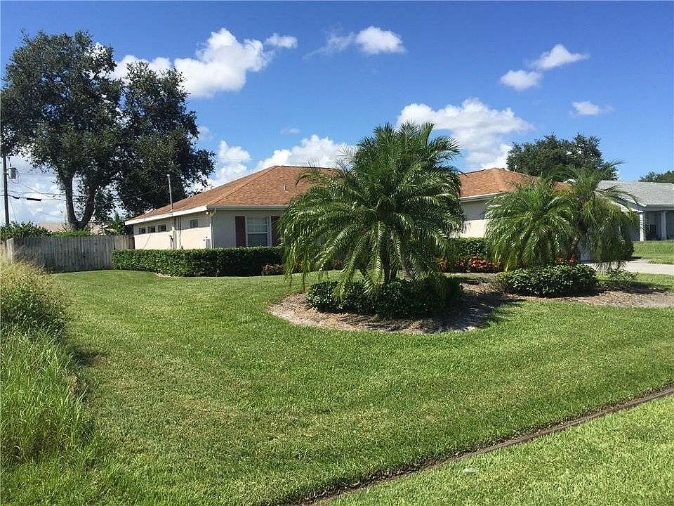 1956 SW Cranberry St in PSL is a CBS home built in 2004.  Note the lovely landscaped yard