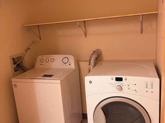 laundry area off of downstairs bathroom