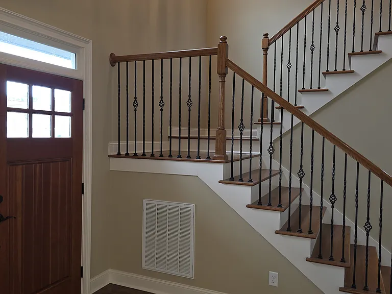 Front entry and stairs to second floor