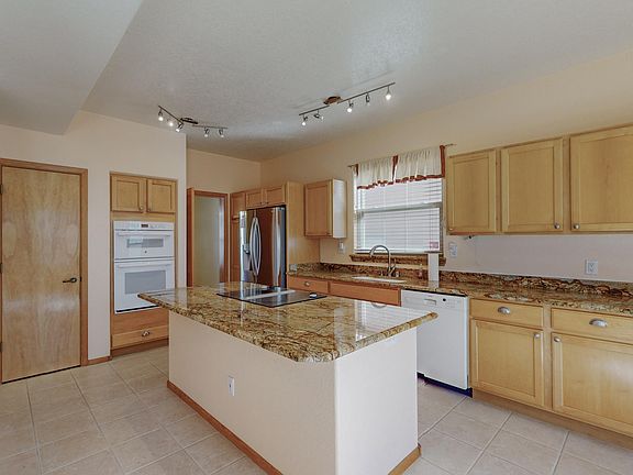 3rd image of 10943 Carreta Dr NW
