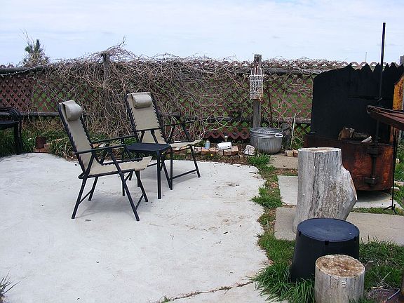 Patio area with fire pit.