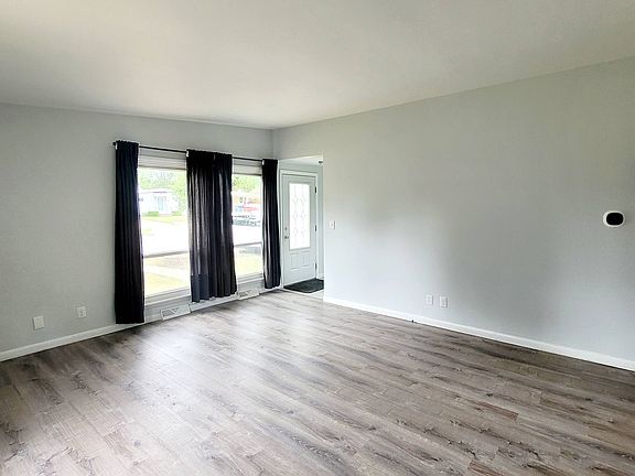 Living room with front entry