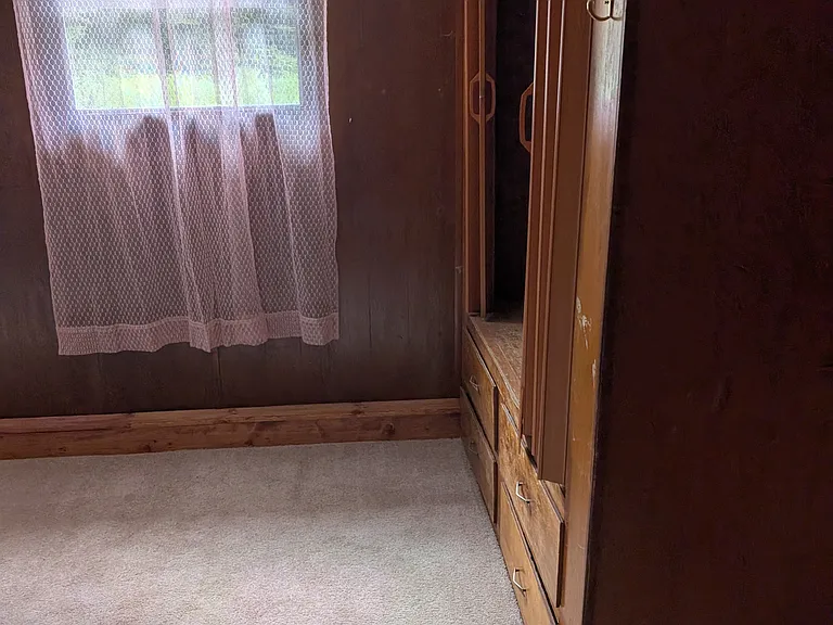 Opposite side of master bed room, closet. Carpet is tan.