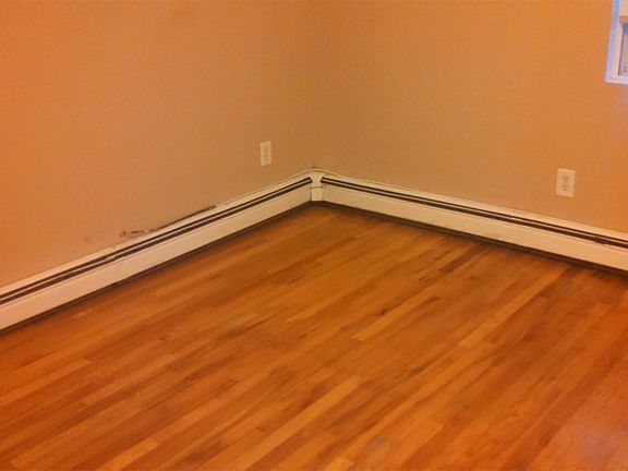 Bedroom (rear left) 9ft 1inX10ft 6in