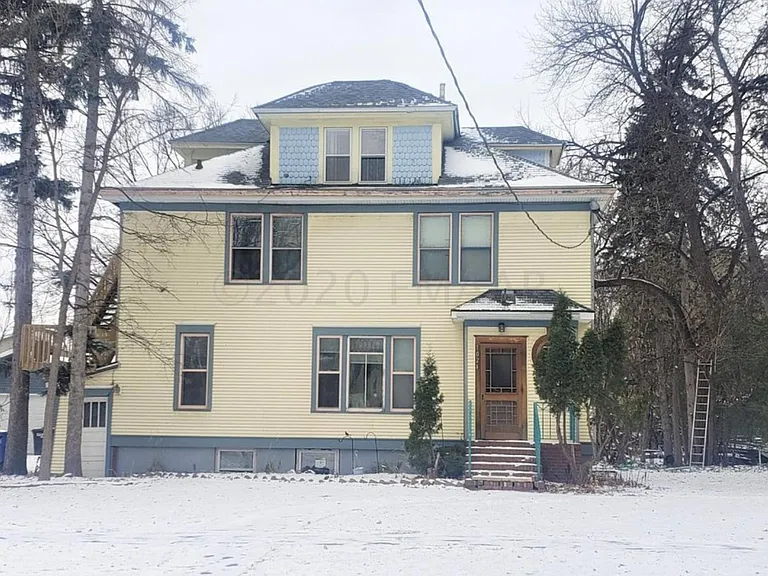 Front of the house facing 7th Street and facing west.