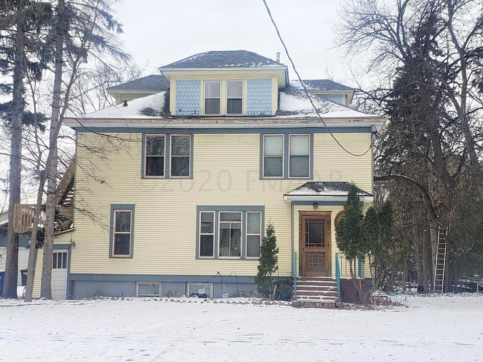 Front of the house facing 7th Street and facing west.