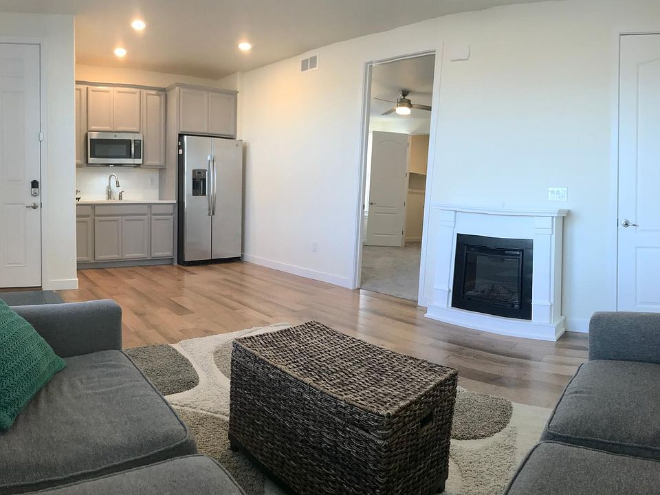 TV is included and hangs above fireplace.