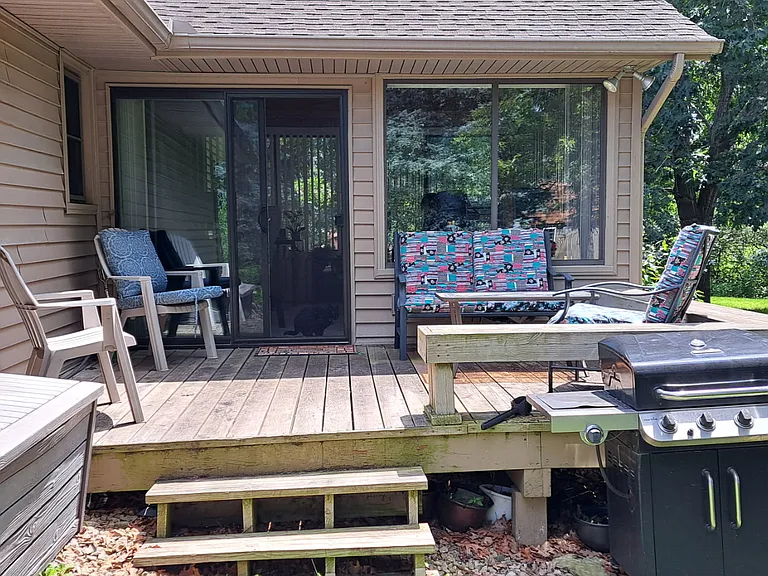 all season sun room with attached deck