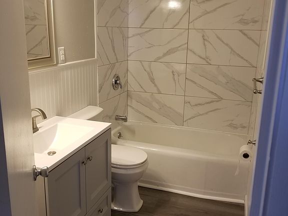 Newly renovated bathroom. Tiled shower.