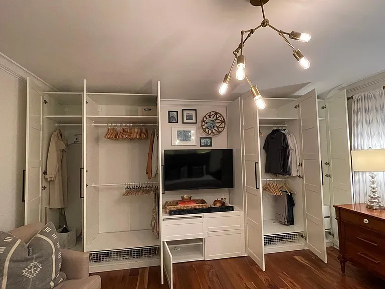 Showing interior of the master bedroom closets.