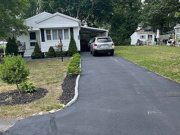 3 car driveway with carport