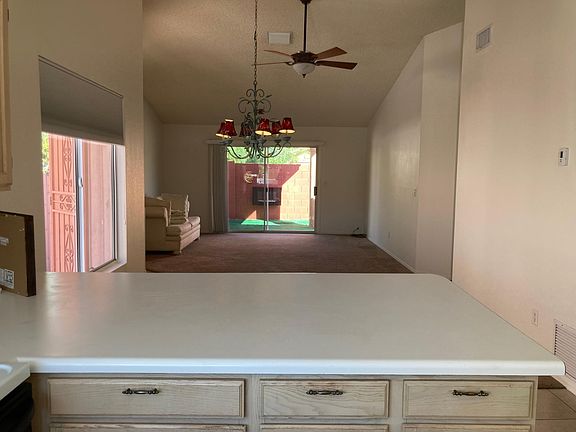 Open concept kitchen, breakfast nook, and living room as viewed from kitchen.