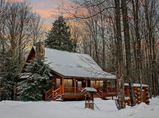 42 Ivy Dr NE, Alden, MI 49612