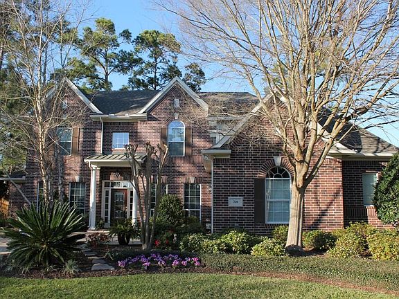 Spring is here! The trees are filling out, flowers are blooming giving this home fabulous curb appeal.