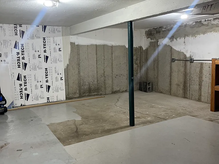 Downstairs storage room underneath garage