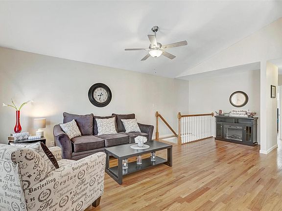Family room with beautiful hardwood floors.