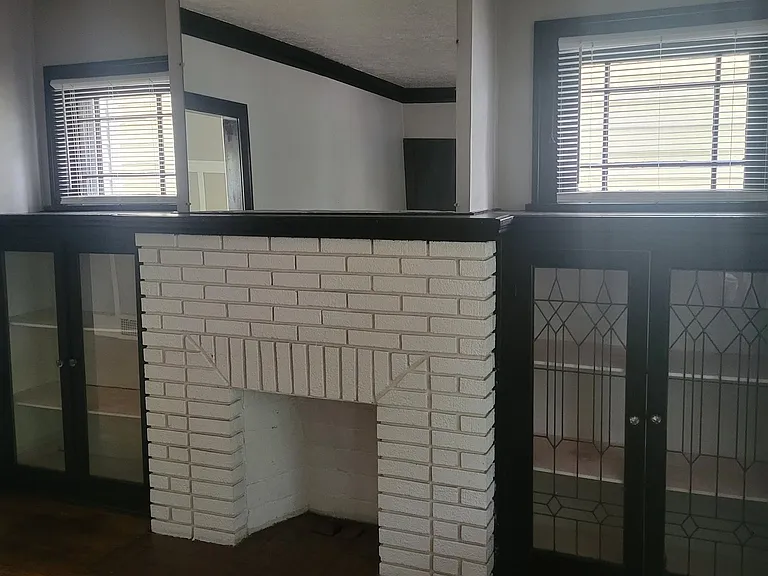 Decorative Fireplace and Built in cabinets in the Living Room