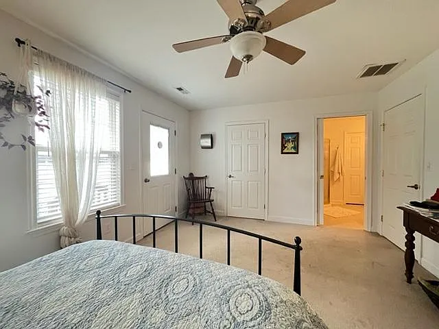 En suite bathroom and huge walk-in closet.