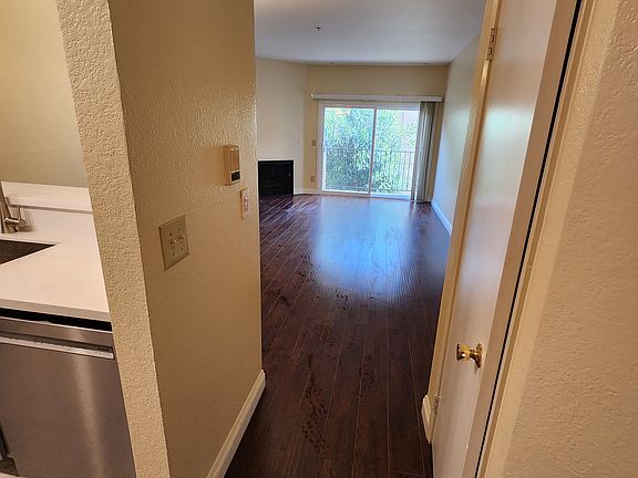 Entry way from Front Entrance to Dining/ Living Room and Coat Closet