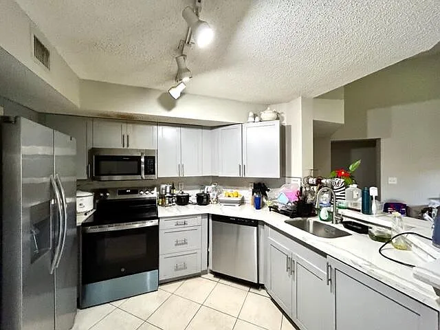 741 N Pine Island Rd #303 — Photo 9