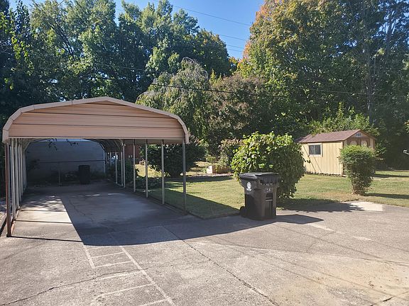 Covered parking and storage shed (right)