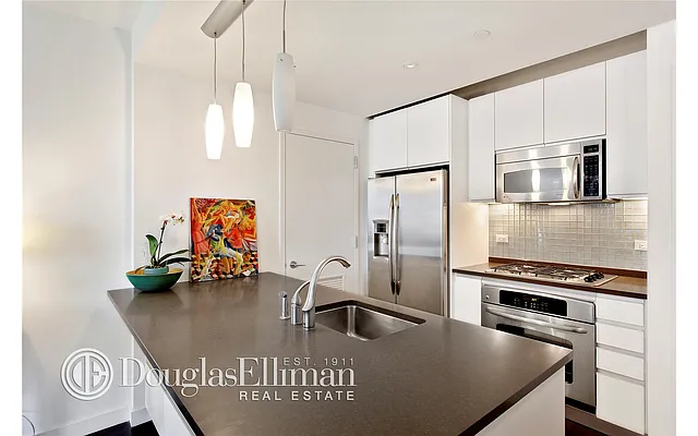 Sold by Douglas Elliman | media 9