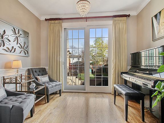 Sitting Room with doors leading to spacious patio.