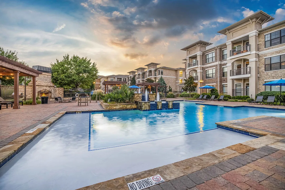 Resort-style Swimming Pool with Tanning Ledge and Sundeck - Bexley Lake Forest