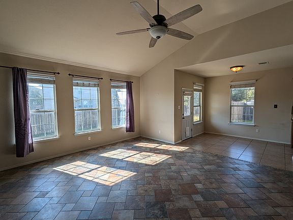 Very Large Main Living area off kitchen with vaulted ceilings and nice breakfast nook