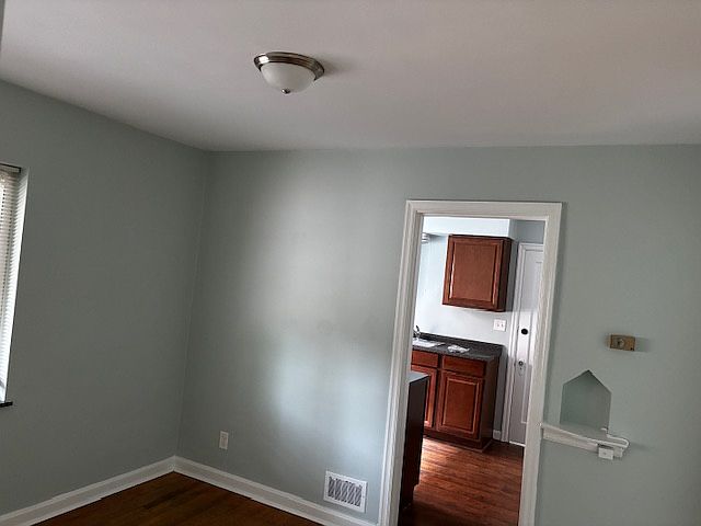 Dining room looking into kitchen